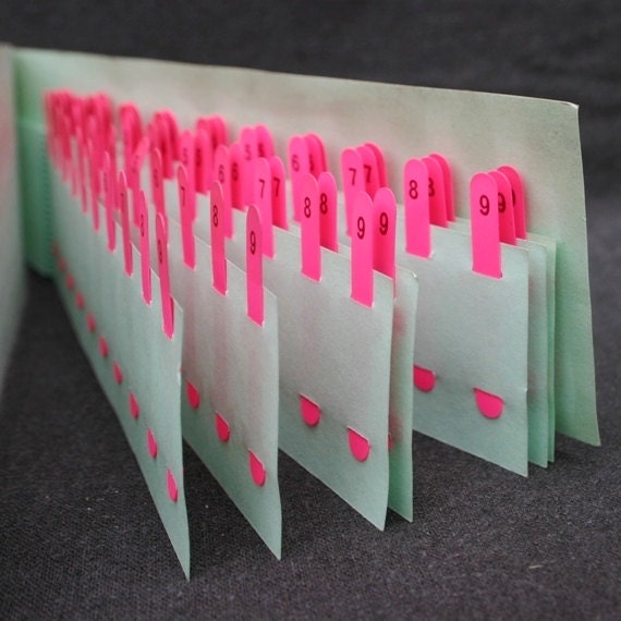 Great hot neon pink celluloid numbered bookmarks