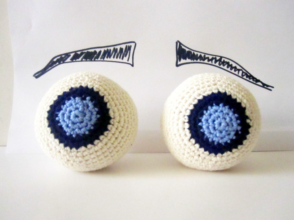 Crochet amigurumi eyeballs decorative. Plush toy.