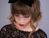 1950s hat . 50s black fascinator with velvet bows . veiled hat . new old stock