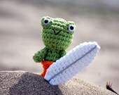 Green Amigurumi Surfer Frog, crochet surfing beach froggy in bright celery green, orange shorts, white surfboard