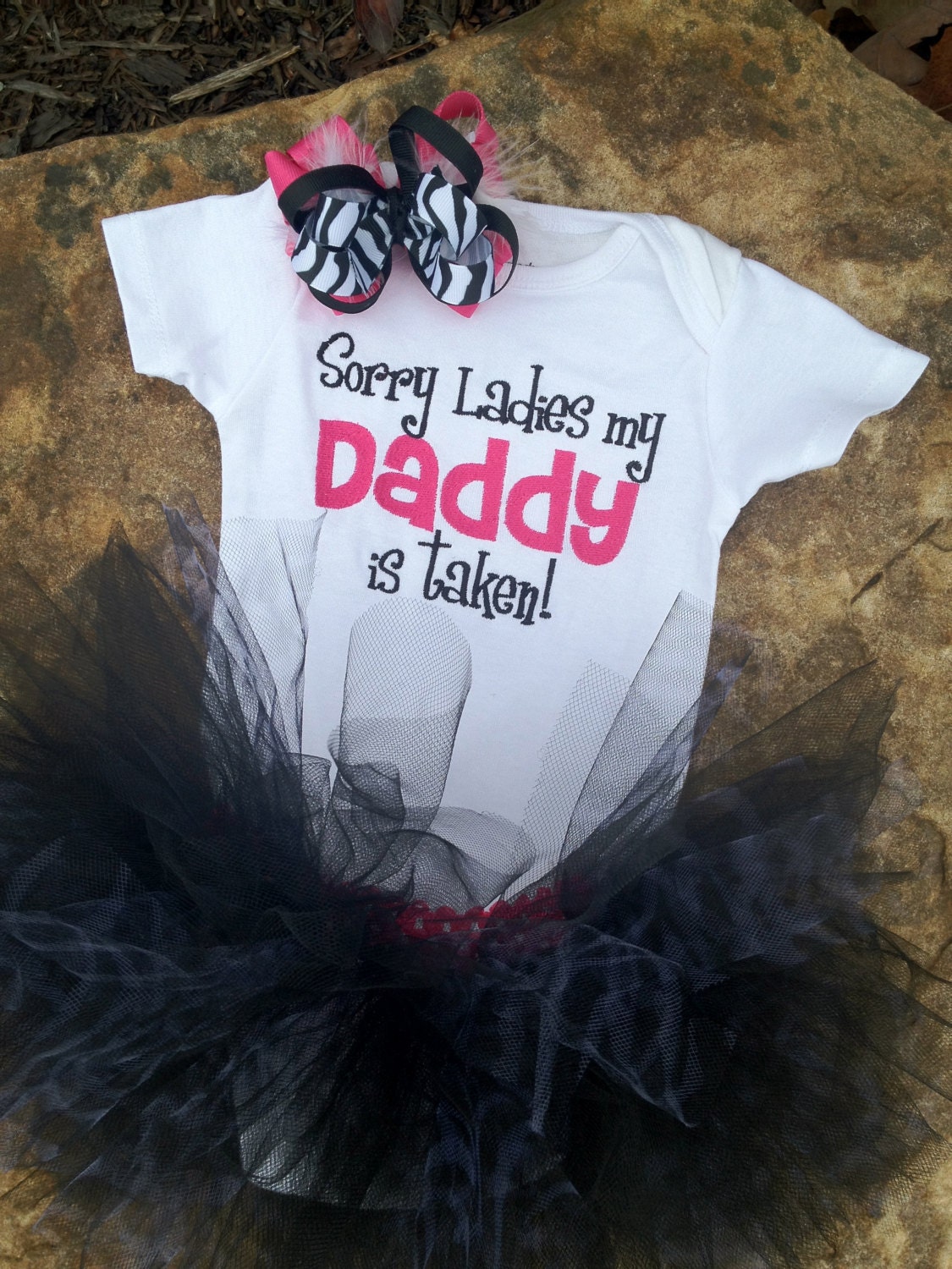 black and zebra print tutu, 'Sorry ladies my daddy is taken' onesie with hot pink, black, and zebra material, and matching hair bow