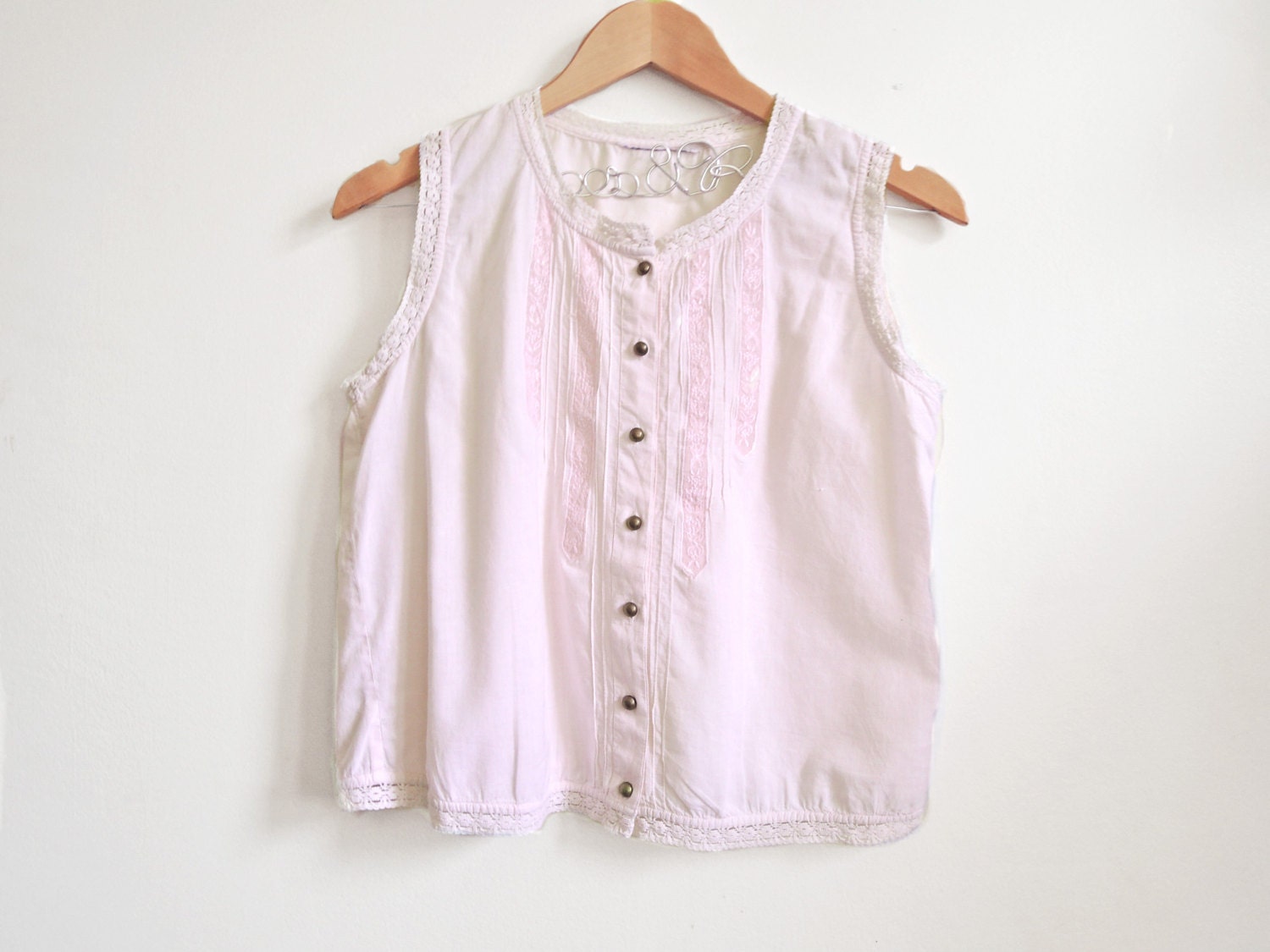 Sheer lace blouse . pastel pink with bronze tone buttons . Guimauve