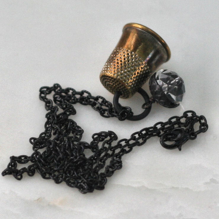 Peter Pan and Wendy Kisses Thimble and Acorn Necklace in Black and Brass