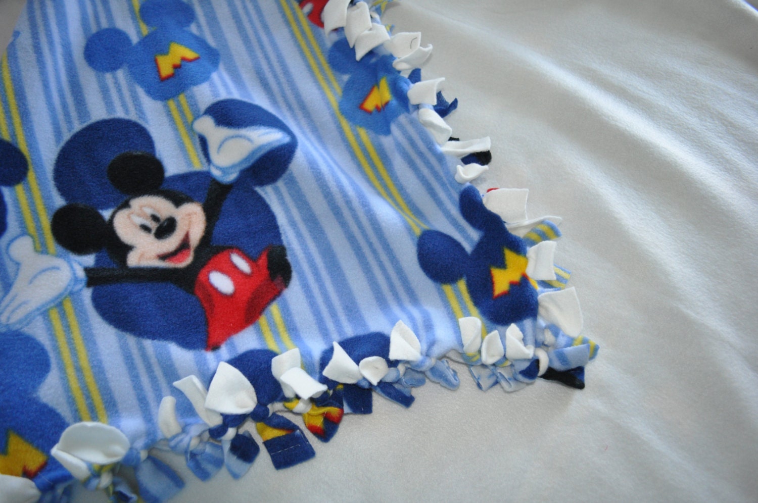Mickey mouse tie/fringe fleece blanket with white background for toddler, ready to ship