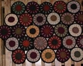 Primitive folk art wool penny rug candle mat