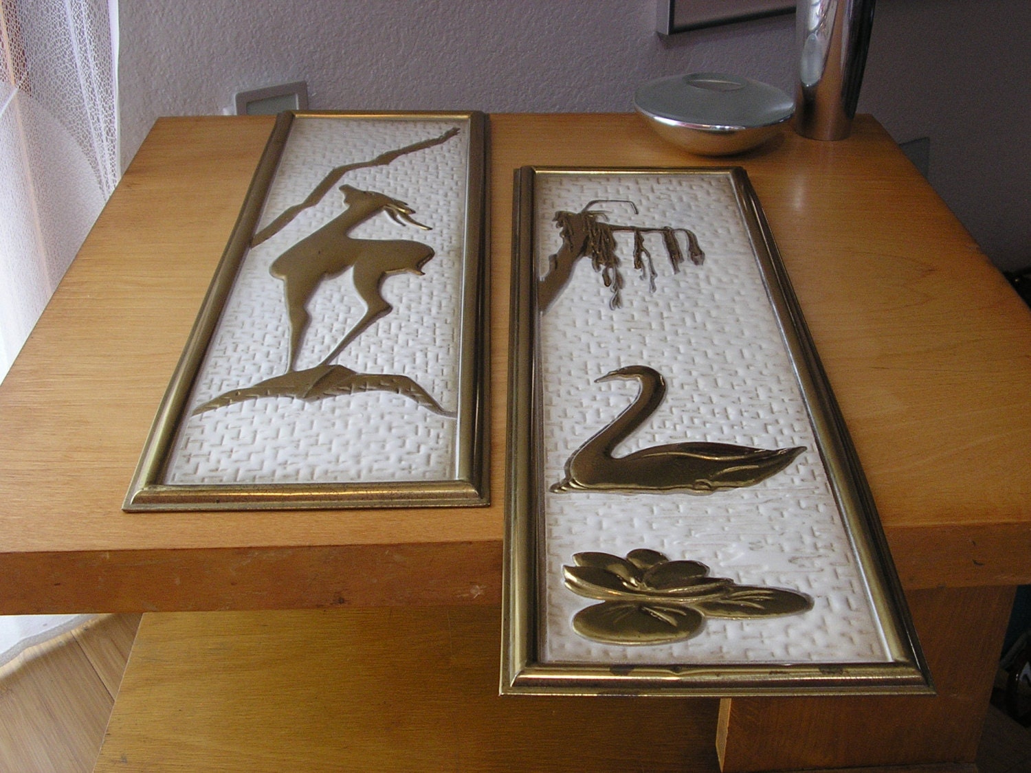 Pair of brass Art Deco wall hangings from Holland