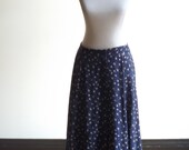 long pleated skirt, high waist skirts, floral skirts, button front skirt, 70s skirt