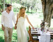 Stunning beaded capped sleeve wedding dress with floaty silk chiffon skirt and embroidered lace top