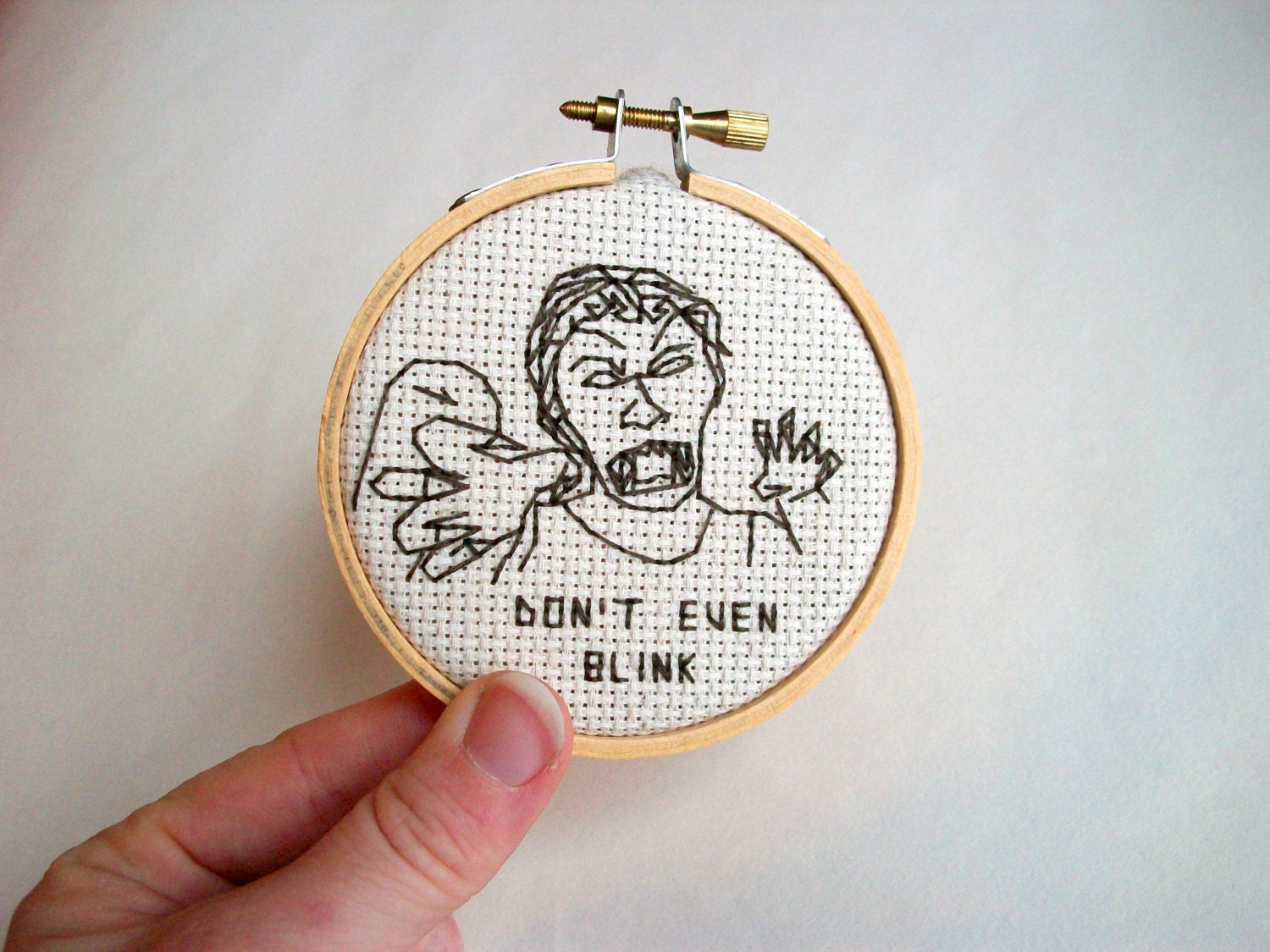 Don't Even Blink Sign -- Modern cross stitch hobo signs for a contemporary (digital) world -- weeping angel attack
