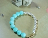 Baby blue vintage beads and pearl bracelet with critter pendant