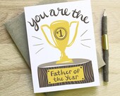 You Are the Father of the Year dads day card calligraphy handwriting gold brown wood congrats new baby award trophy clever funny handsome