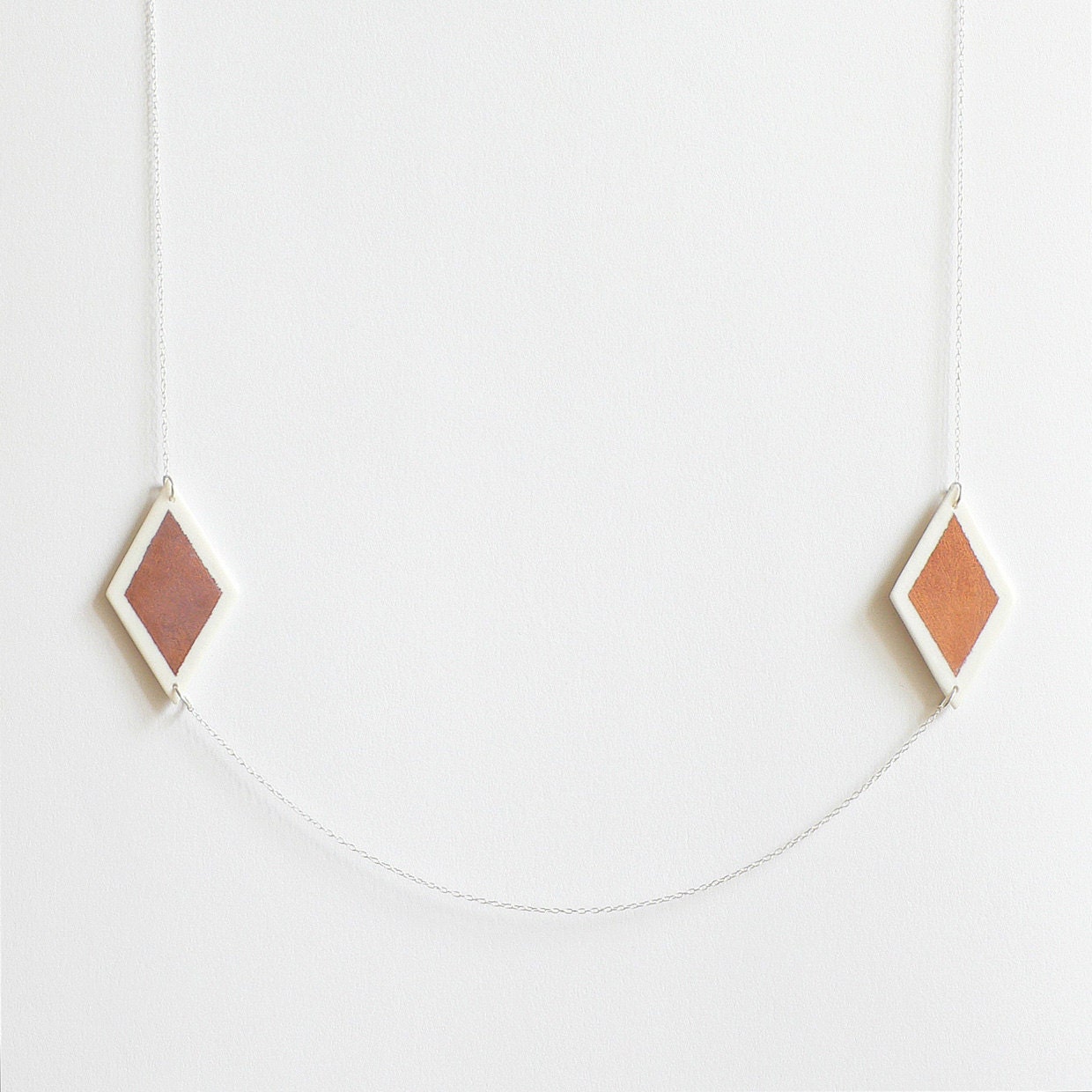 L u c i a - Geometric necklace - Diamonds in unglazed white porcelain & pink coppery mat - Sterling silver chain - EleÏa Collection
