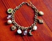 ON SALE Vintage Charm Bracelet  / Gold Colored / Moon / Heart / Diamond / Beads / Collectable Charms / Antique Bracelet / Witch