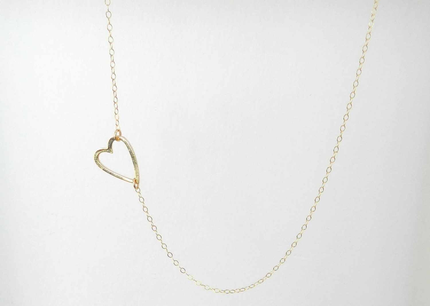 Kailyn. Asymetrical heart necklace with gold filled chain.