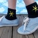 a "Summer Sunshine" - Hand Painted Black Socks for Bigger Feet: Simple Tribal Sun (kid large/xl - women's xs/small)