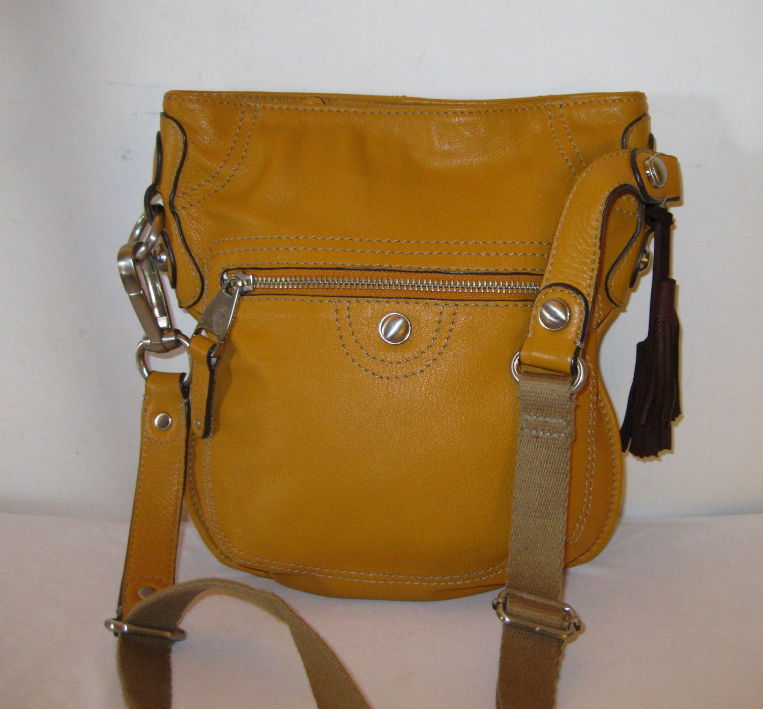 Makowsky sm cross body messenger bag handmade tassel detail