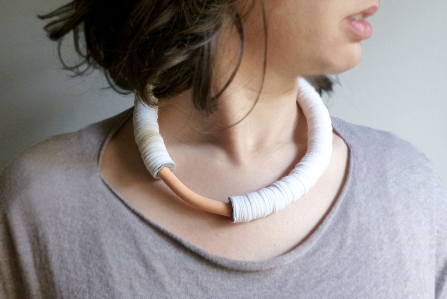 white felt geometric bold necklace with a salmon pink ceramic curve bead - contemporary jewelry - pergamondo