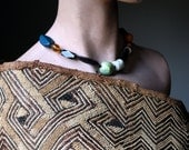 Earth and Sky--an Artisan Bead Necklace on Waxed Cotton Cord with a Handwoven Closure - LaTouchables