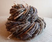 Handspun art yarn with lace and beads