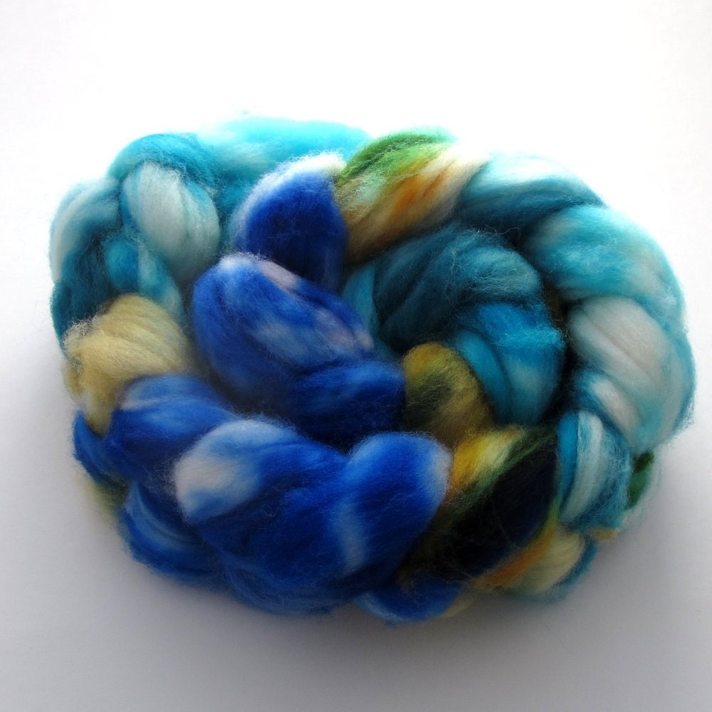 hand-painted superwash merino top from three fates yarns