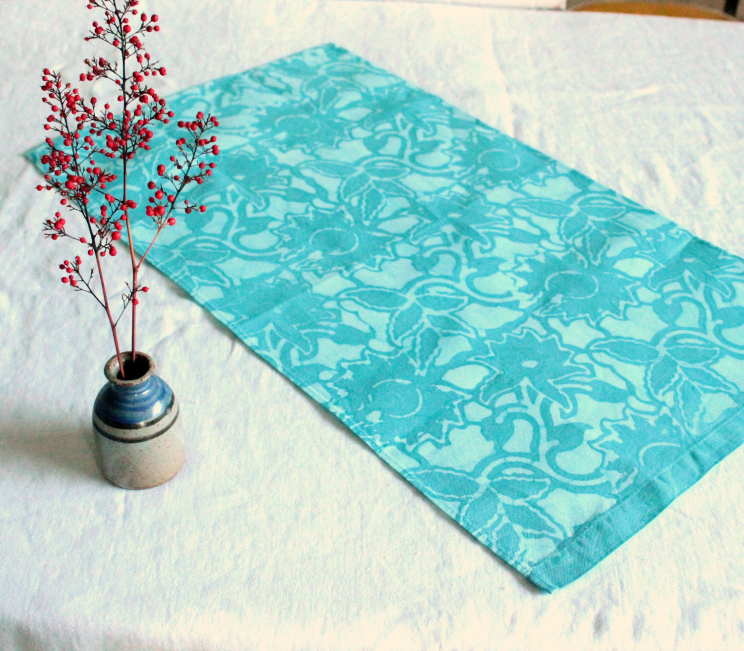 turquoise linen tea towel. hand made batik fabric