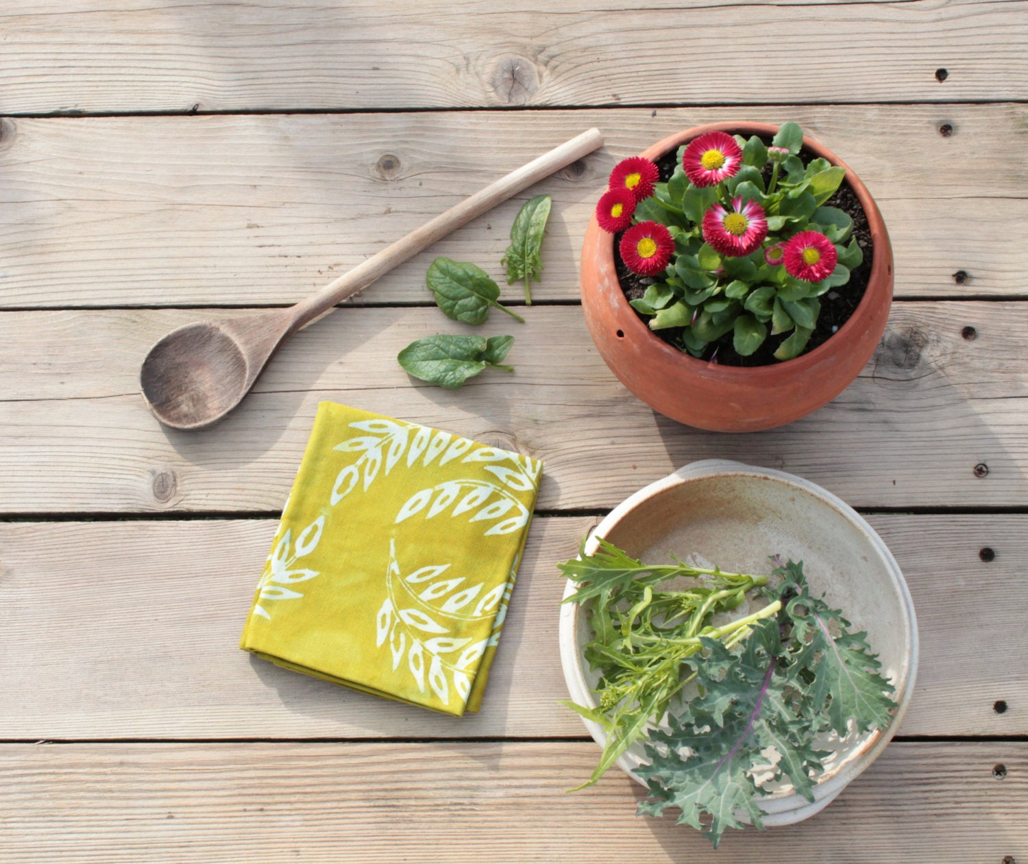 moss green linen tea towel. wheat batik print