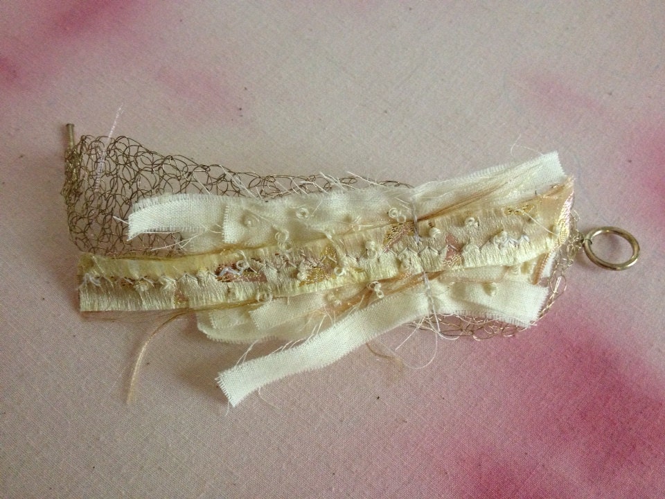 Sterling Silver crochet bracelet with cream fiber fabric