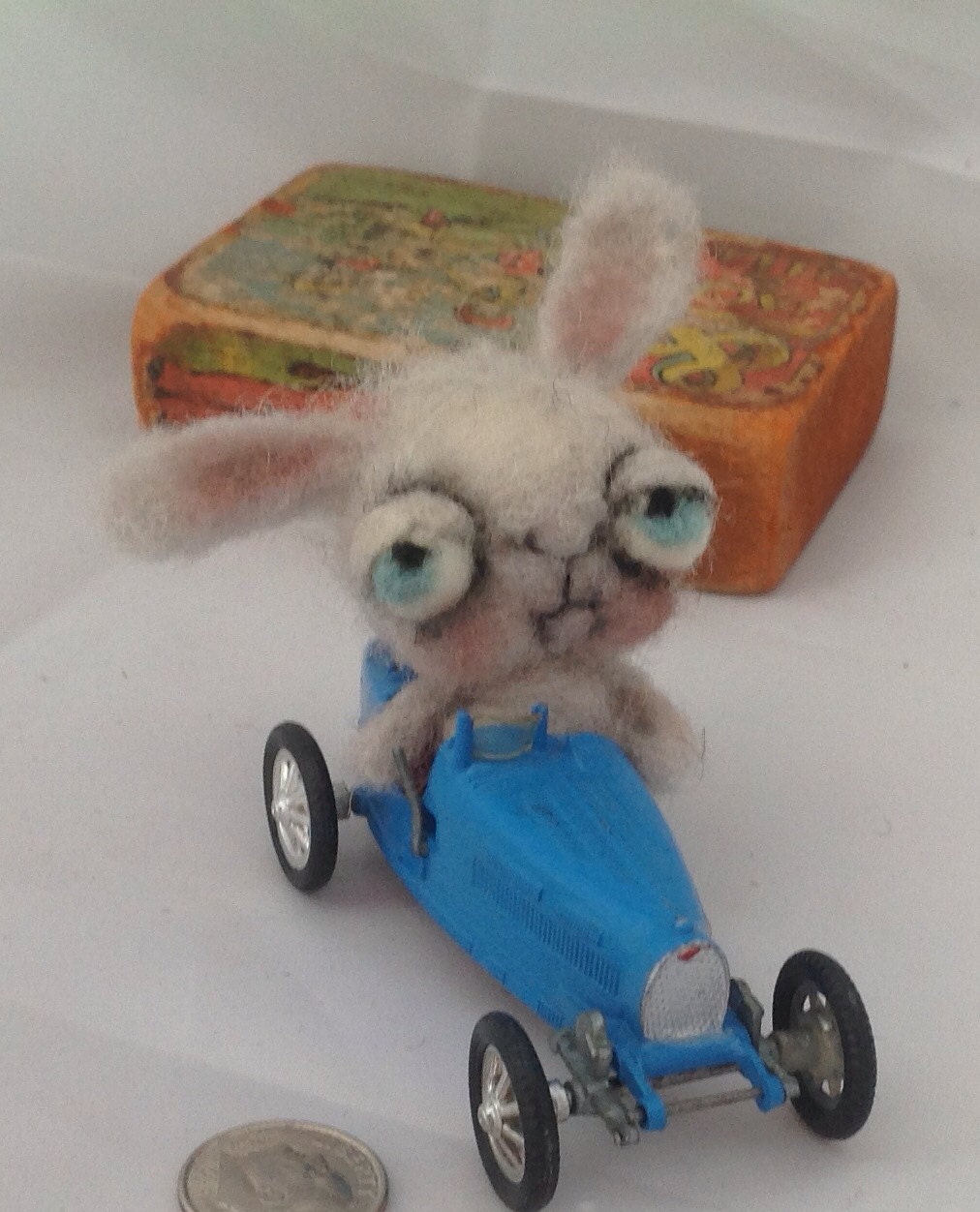 Bunny in a blue Bugatti 