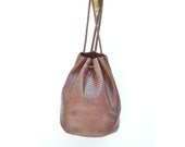 vintage brown woven leather backpack