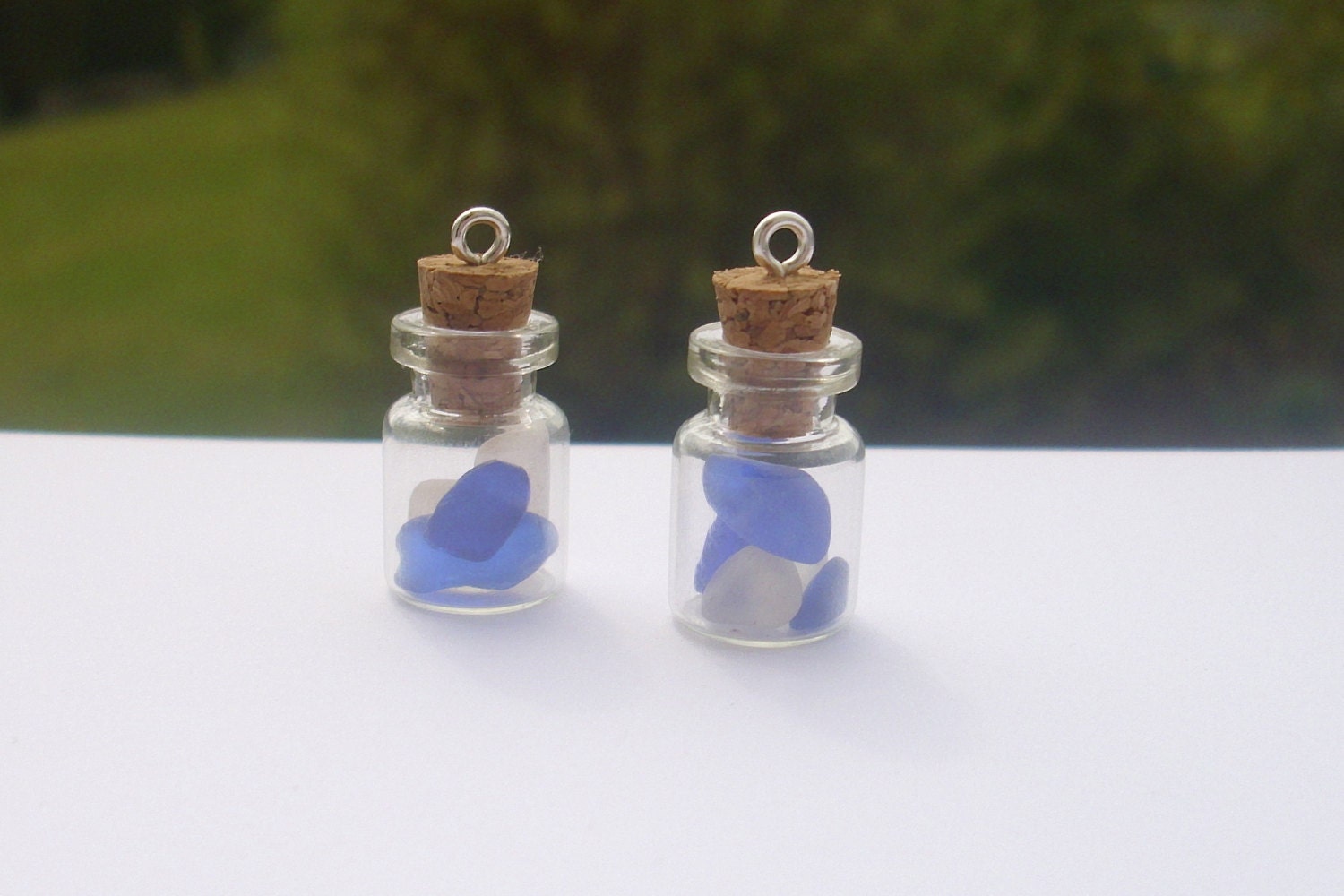 2 sea glass filled vial bottle