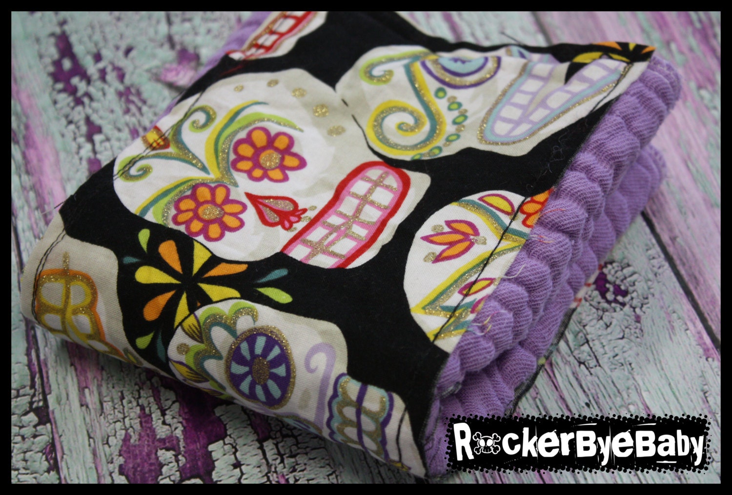 ONE Punk Rock Black Calaveras Burp Rag or Cloth diaper for your baby girl or boy on purple hand dyed prefold Hemp