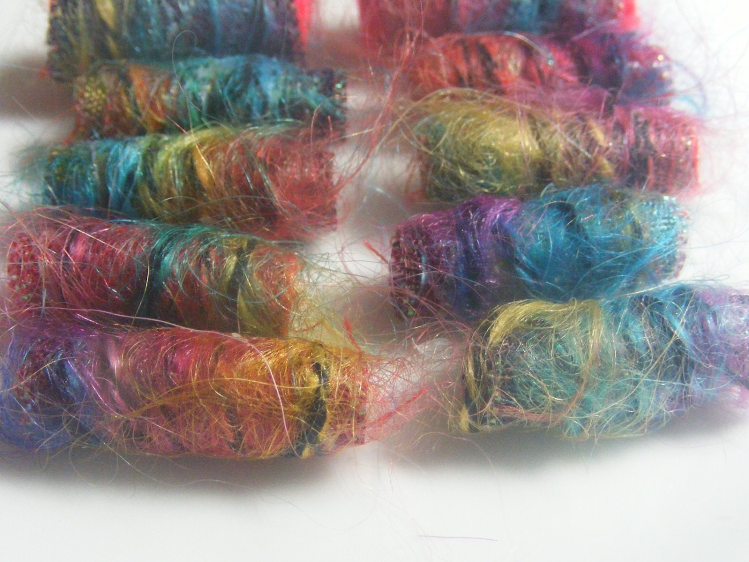 Textile Bead multicolor brights We would never put up with feeling restricted by wearing neutral colors. She wouldn't dare.