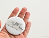 A pinback button with an original photo of a tiny hedgehog in light sepia tones -a small African hedgehog - gift from woodland