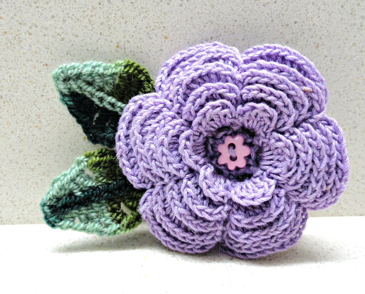 Purple crocheted  flower Jewelry Brooch 5 layers with Two green leaves handmade by artefyk Tagt team