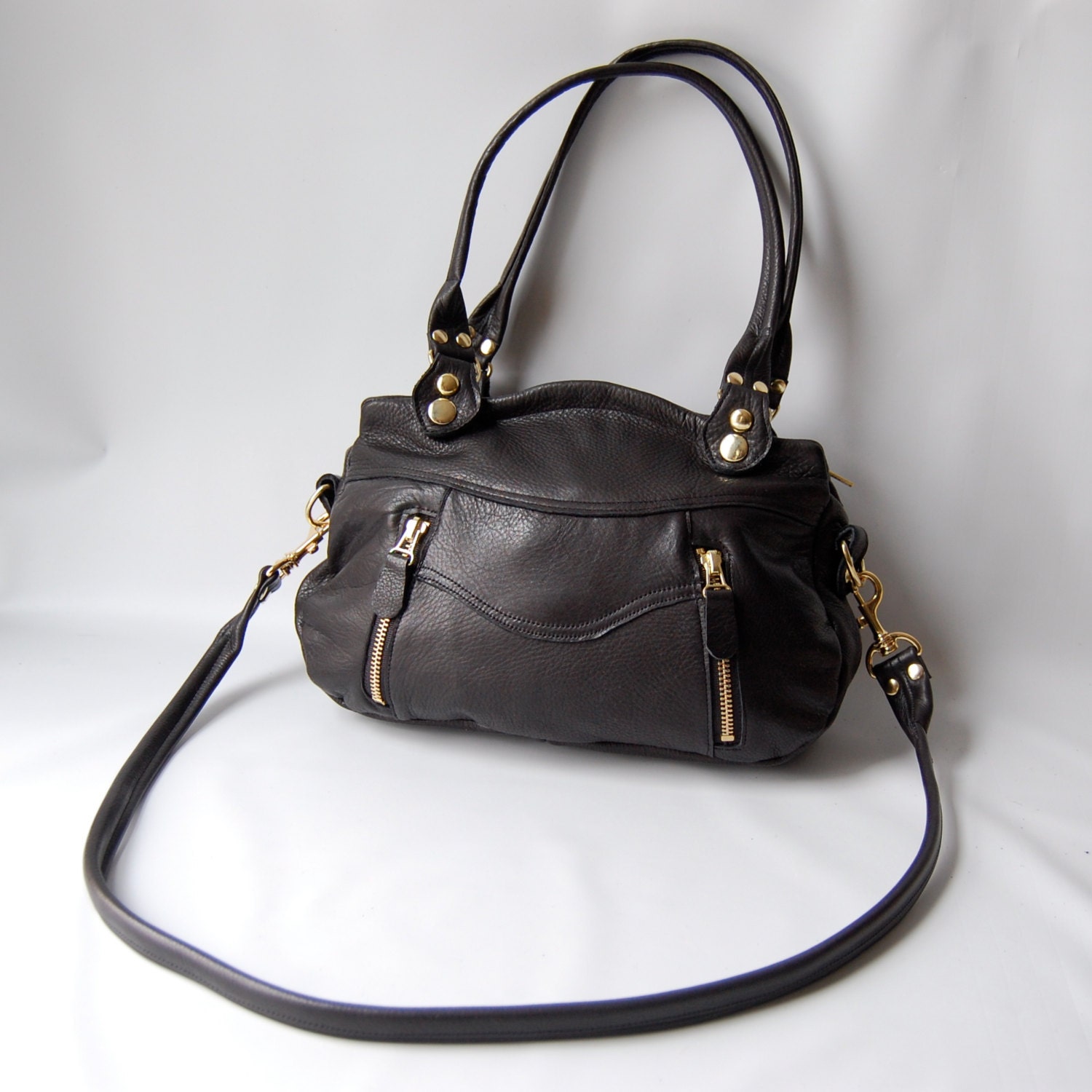 Small Larch leather bag in black // large back pocket