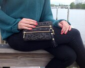 Double zip leather wallet in lazer cut lamb skin