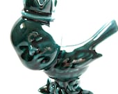 Swoop the baby bird king in bottle green