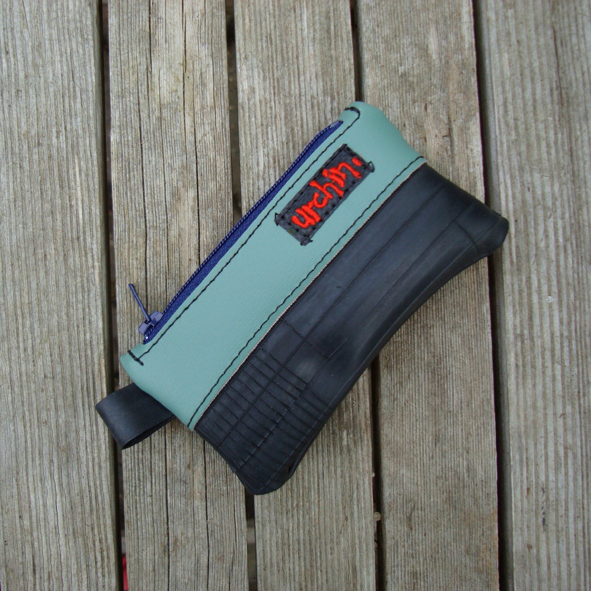 Eco friendly mini change purse wallet made from bicycle inner tube and scrap orange vinyl