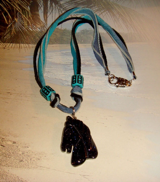 Blackstone horse pendant on a silk ribbon and black leather suede necklace