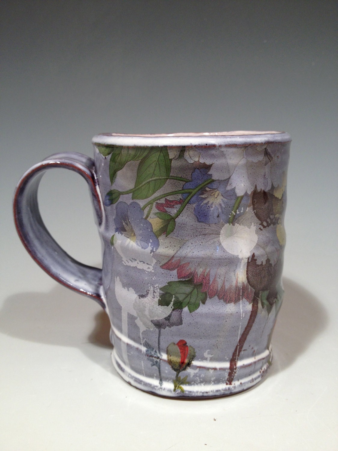 Mug with  purple and white glaze and red poppies