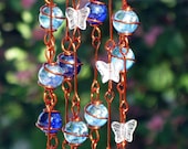 Iridescent Royal Blue and Sky Blue Suncatcher with Copper Wrapped Glass Marble Prisms and Clear Glass Butterflies