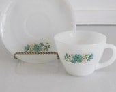 Fire King floral cup and saucer, cheerful aqua floral design