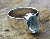 Sterling silver ring with blue aquamarine cabochon