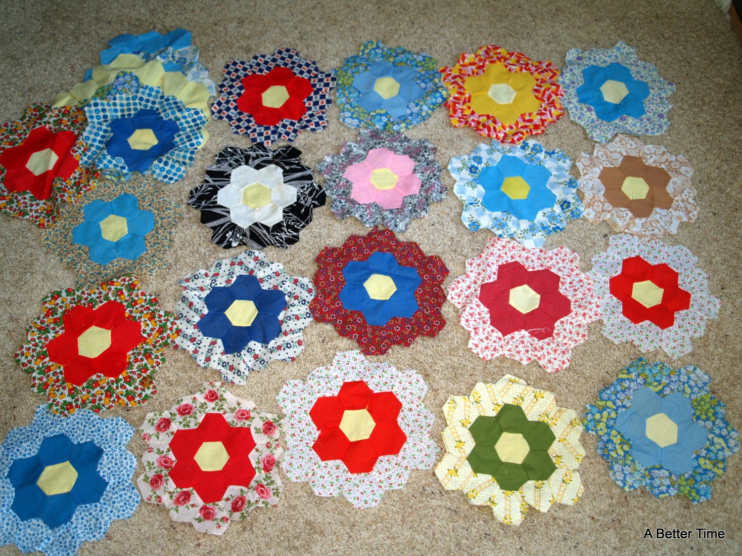 22  vintage Grandmother's flower garden Hand Stitched Quilt Blocks