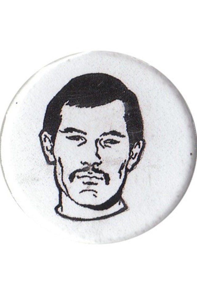 Set of two men pin back buttons