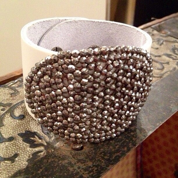 White leather cuff bracelet with vintage steel cut buckle