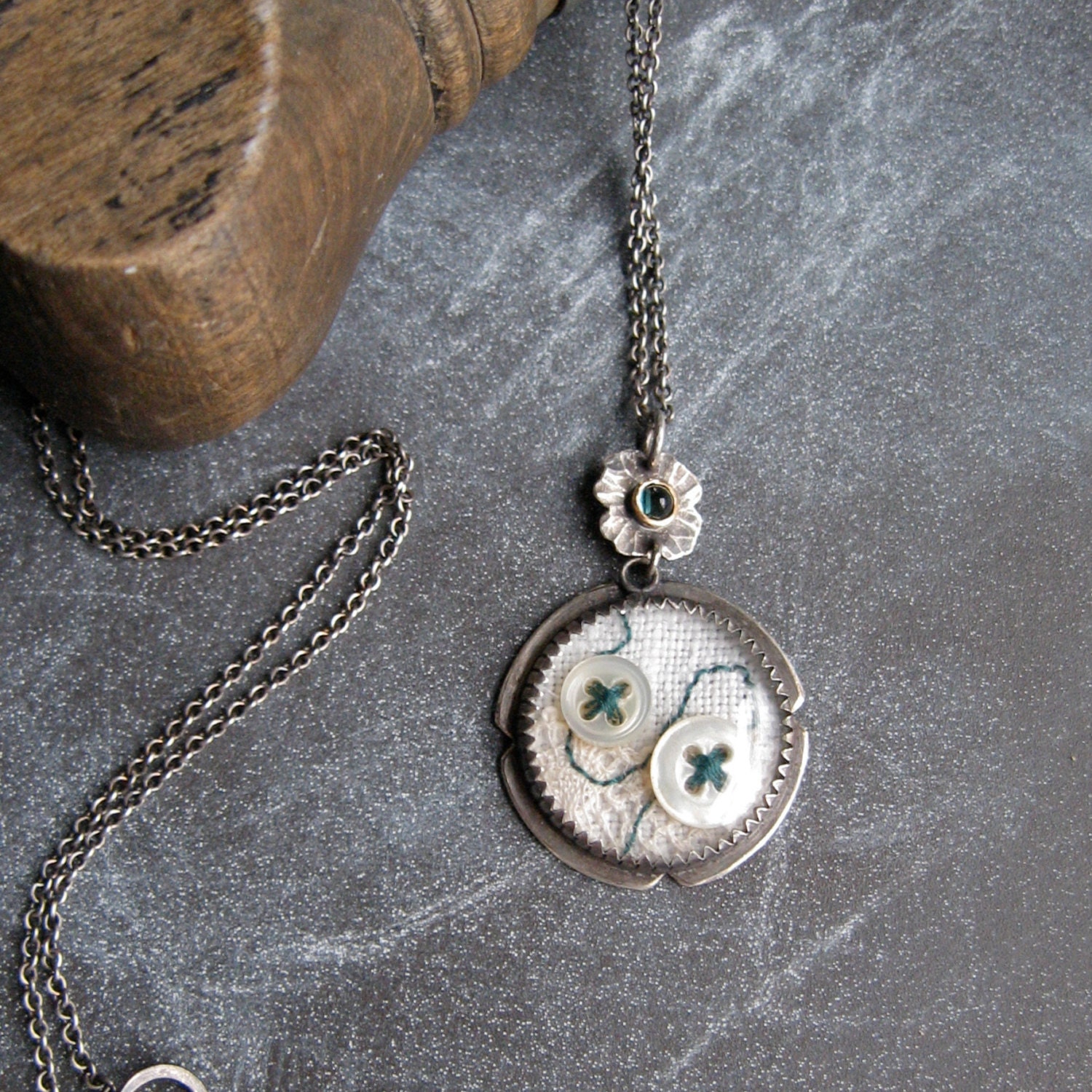 PENDANT sterling silver with vintage watch crystal, buttons, and green tourmaline