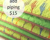 add piping to your bumper (pick your fabric)