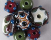 Handmade Lampwork Glass Bead Set of 7 by Patti Cahill, sra -- Picasso's Plate color scheme with knobby focal