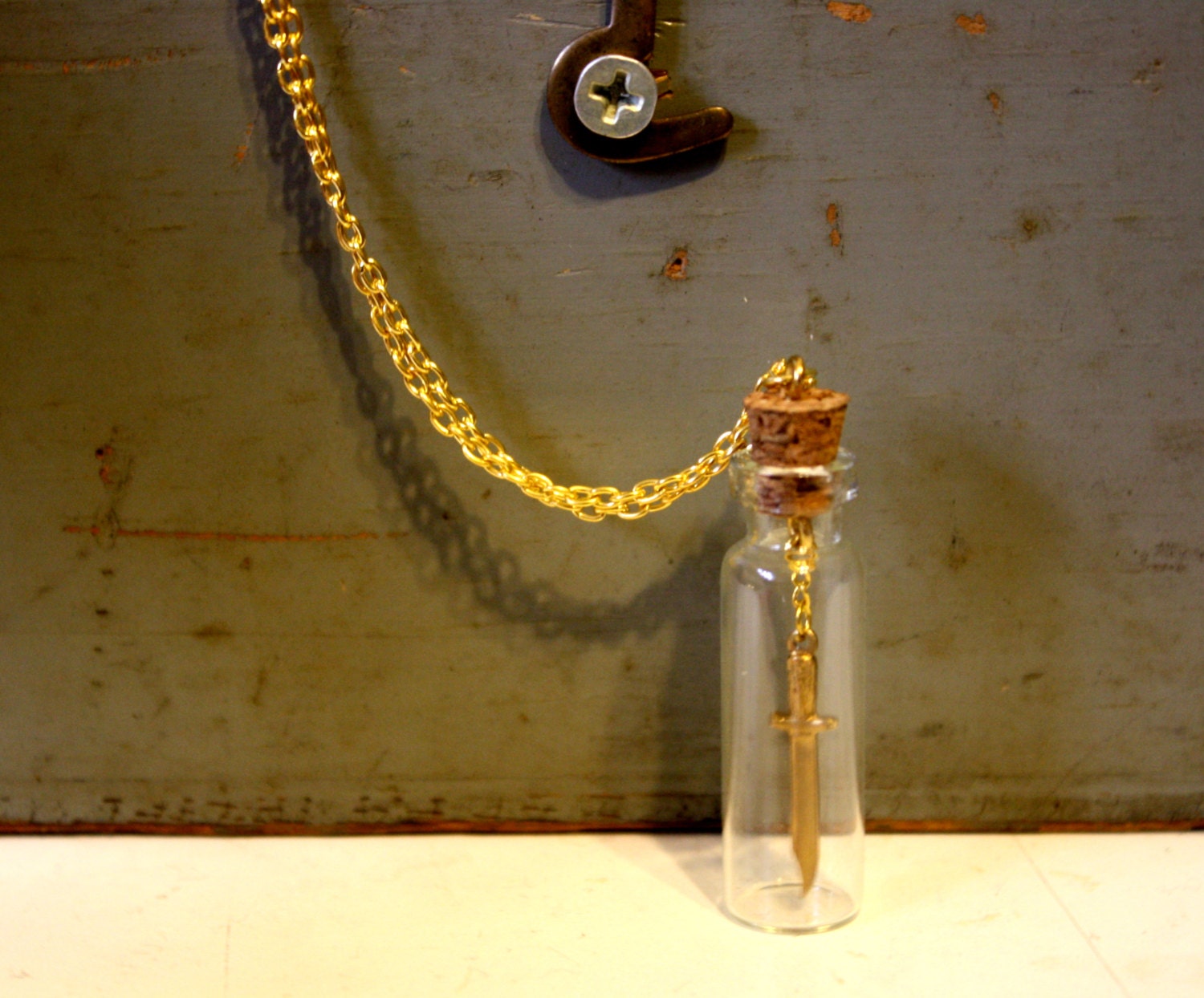 VTG OOAK Brass knife hanging in Long Glass Bottle Necklace